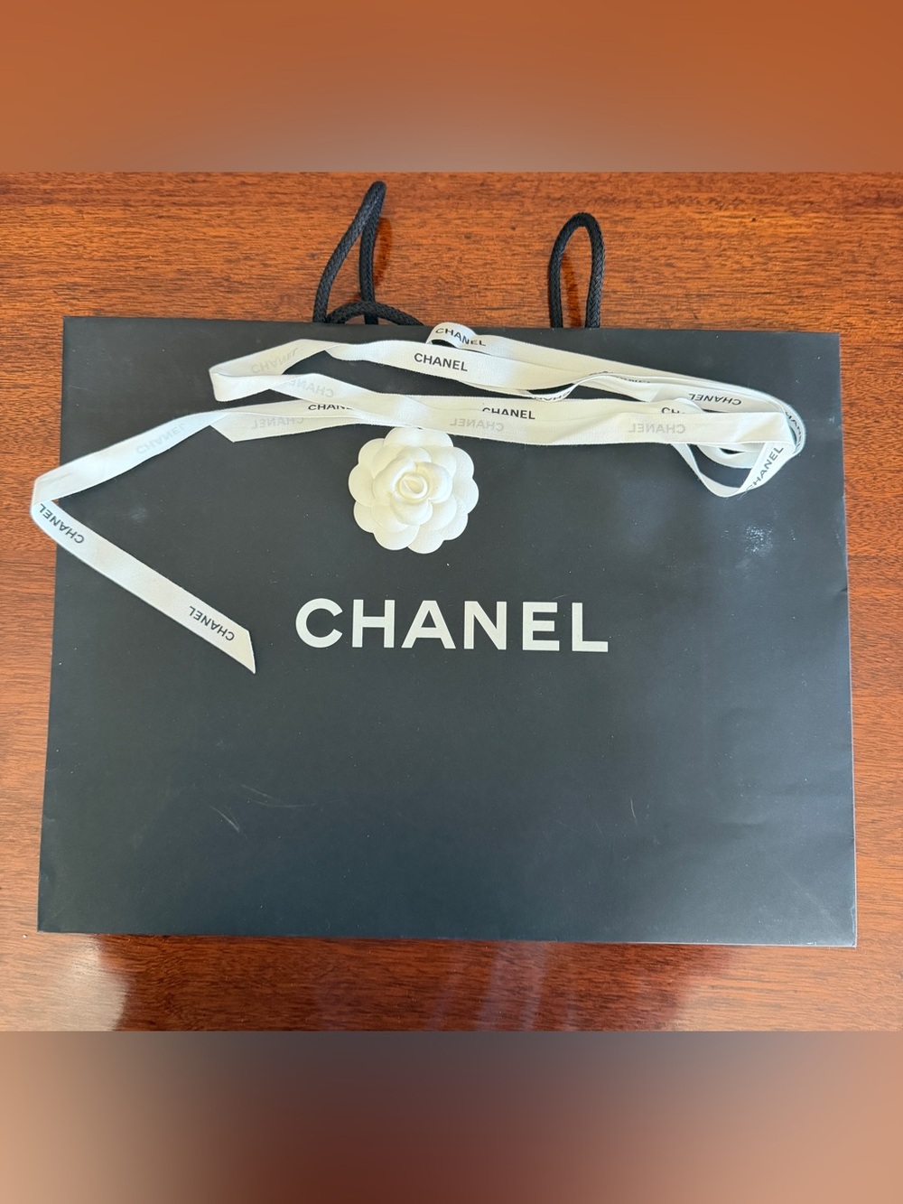 CHANEL Black bag White Camellia and white Chanel  ribbon